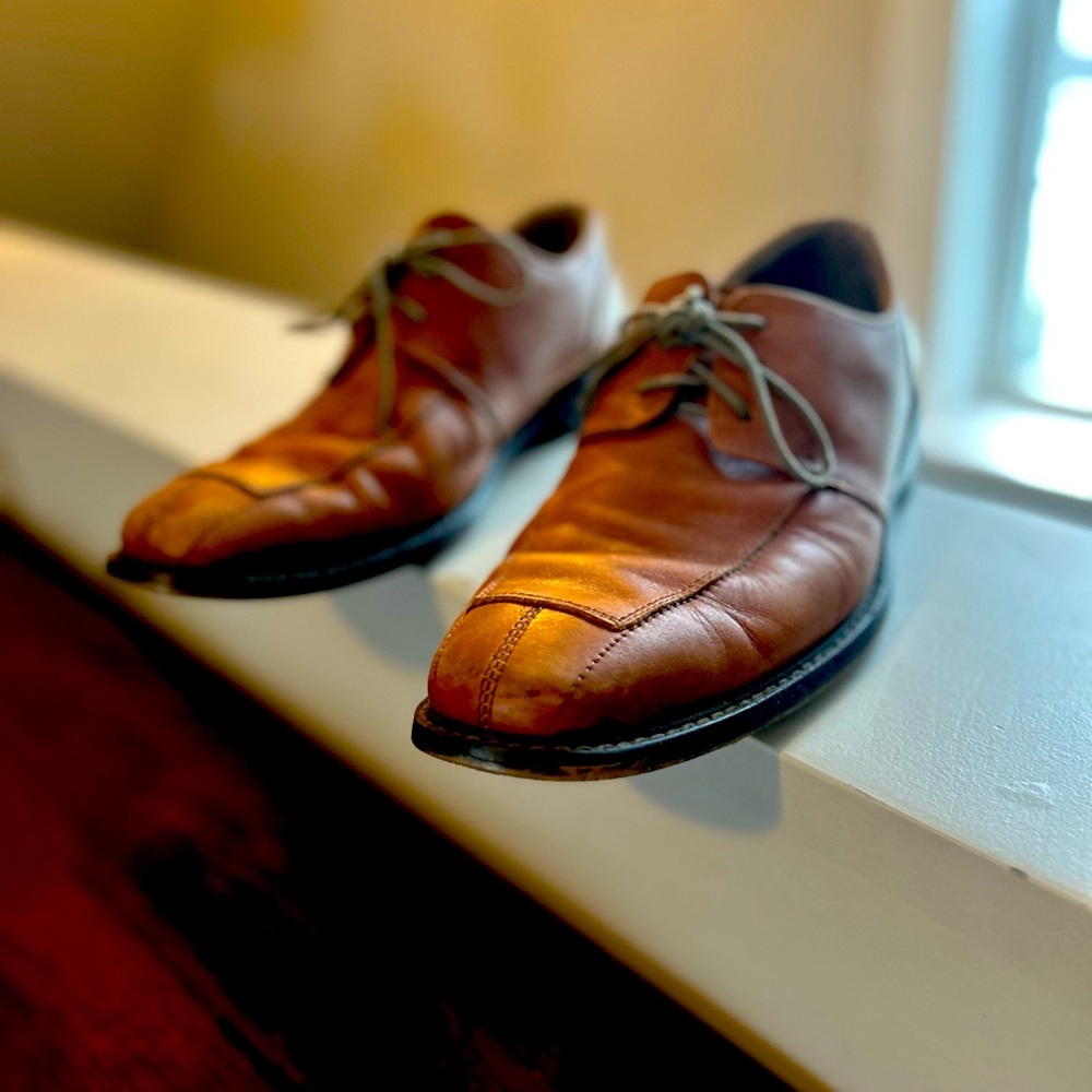 Camel brown leather dress shoes.